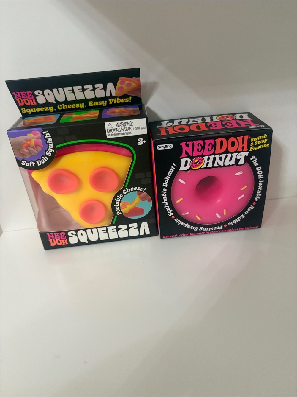 NeeDoh Squeezza Pizza & Donut Sensory Stress Toys - Pink & Yellow